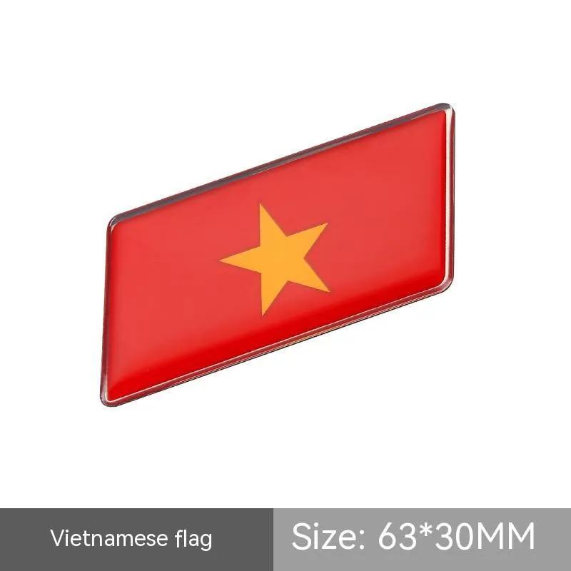 Aluminium national flag car sticker with metal crystal tail tag measuring 6.3cm by 3cm showing parallelogram shape