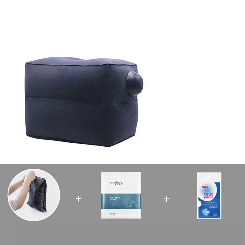 Gray inflatable foot pad with push-on button and adjustable storage bag containing travel accessories