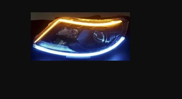 60cm ultra-thin car LED tear light guide strip in white yellow two-colour mode on a dark background