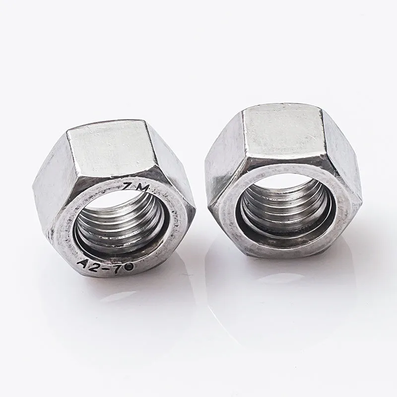 304 stainless steel thickened hex nut assortment from M6 to M56 metric sizes on grey background