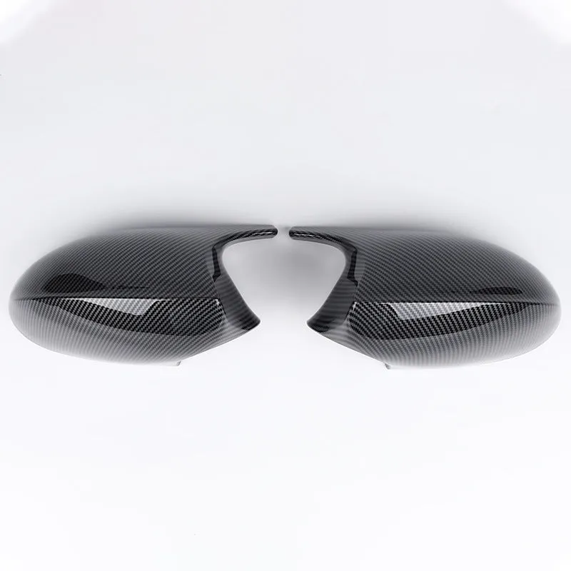 Pair of black ABS plastic rearview mirror shells for BMW 3 Series E90 car.