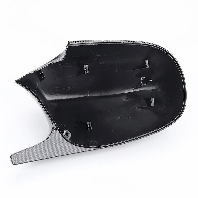 Pair of black ABS plastic rearview mirror shells for BMW 3 Series E90 car.