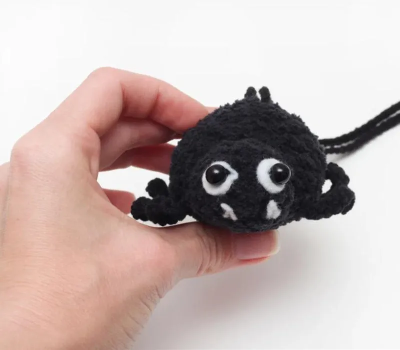 Hand-woven plush automobile hanging ornament with cartoon design for car interior decoration