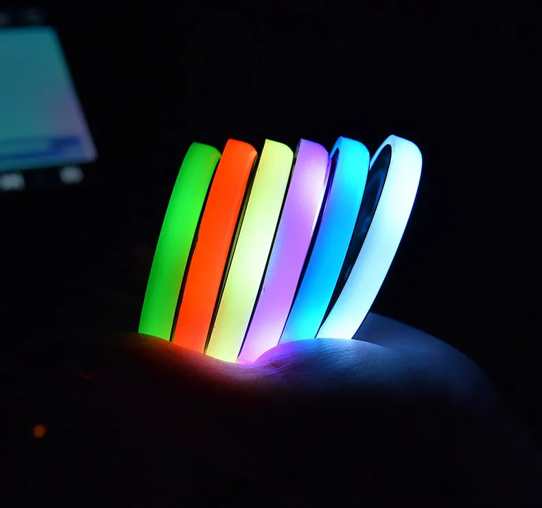 Colourful LED light-up coaster for car cup holder with USB cable and seven light colours.
