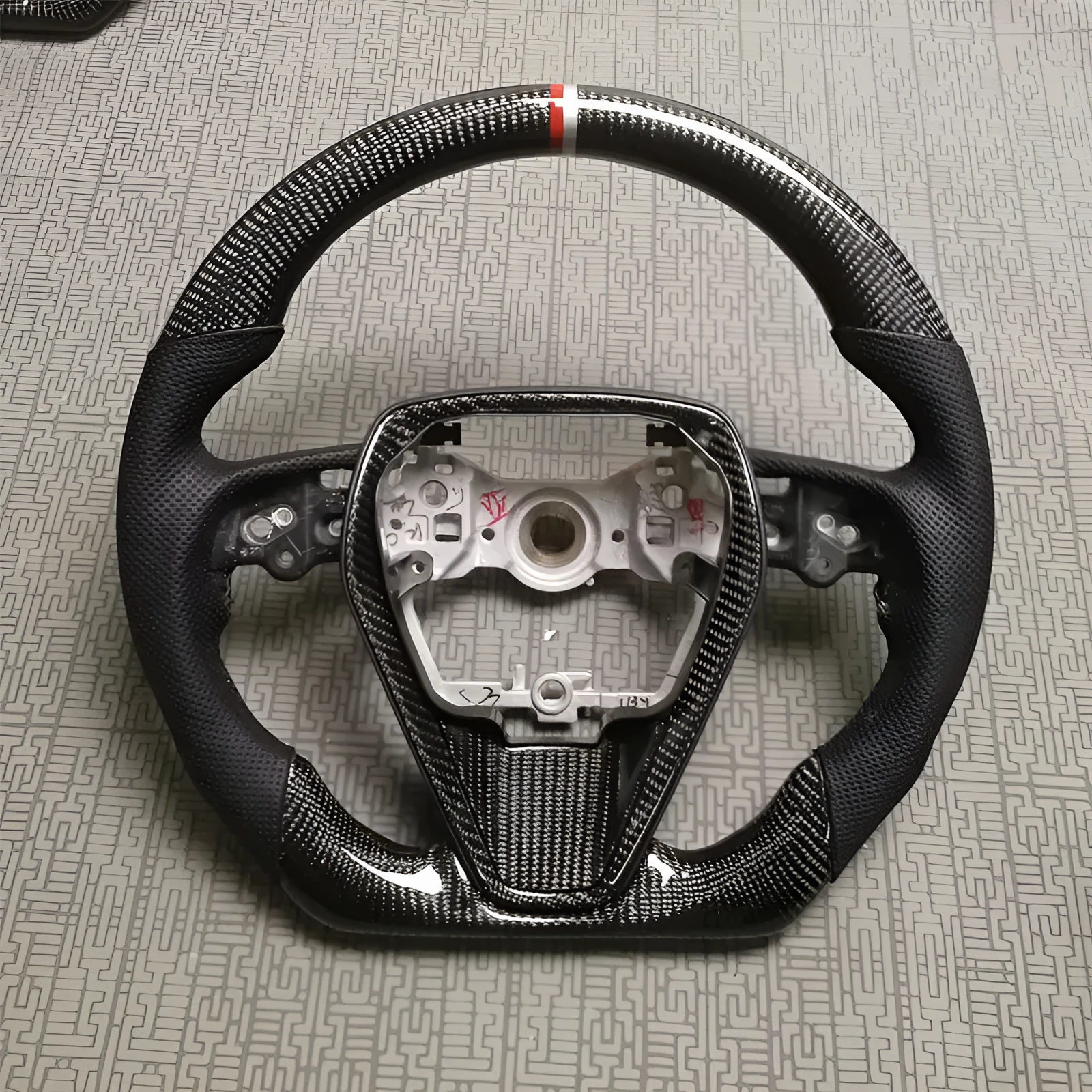 Carbon fibre steering wheel assembly for eighth generation Toyota Camry with six style options available