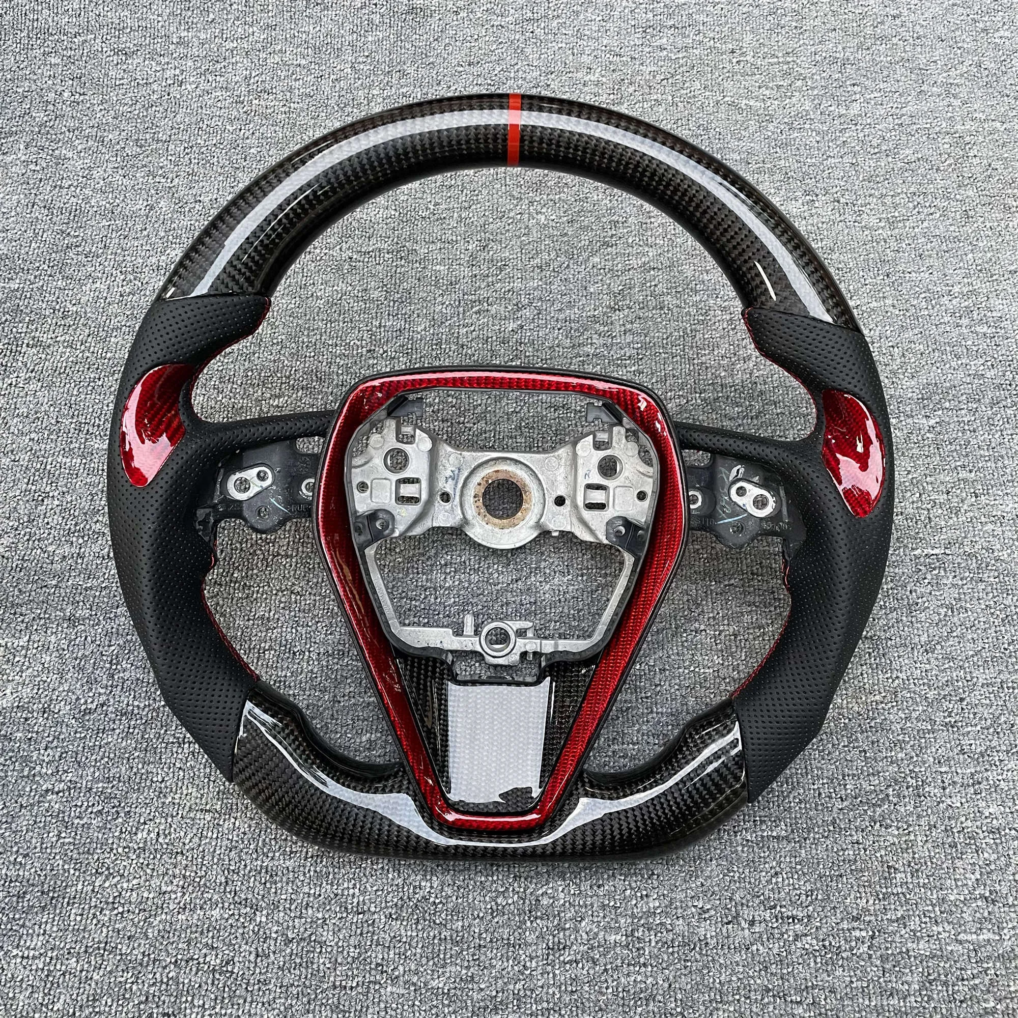 Carbon fibre steering wheel assembly for eighth generation Toyota Camry with six style options available