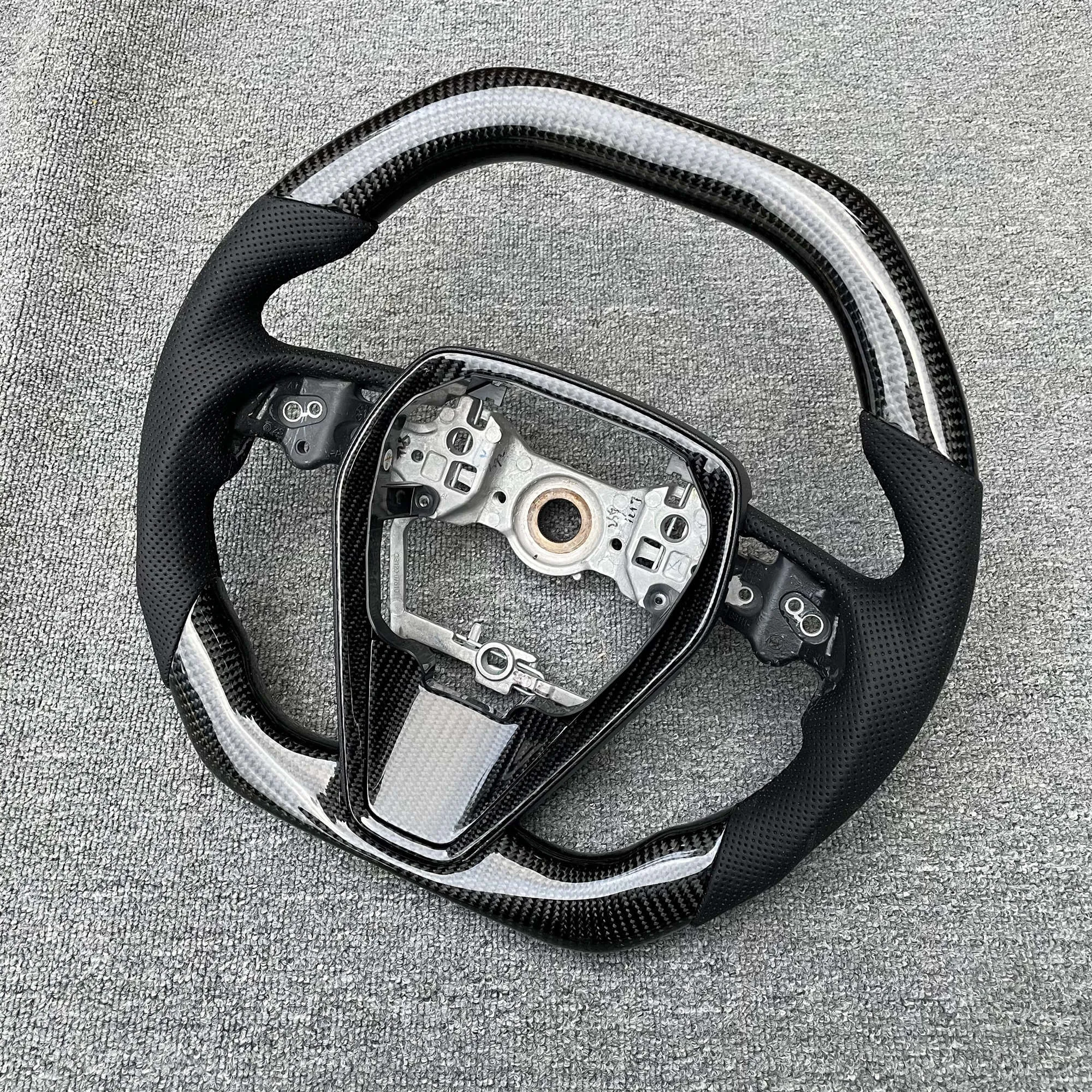 Carbon fibre steering wheel assembly for eighth generation Toyota Camry with six style options available