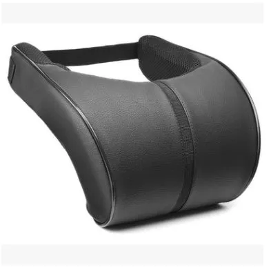 Black memory foam neck pillow car headrest with slow rebound and leather surface on a seat