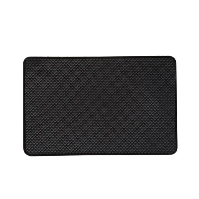 Black small mesh non-slip mat 18x13cm on car dashboard holding mobile phone and coins