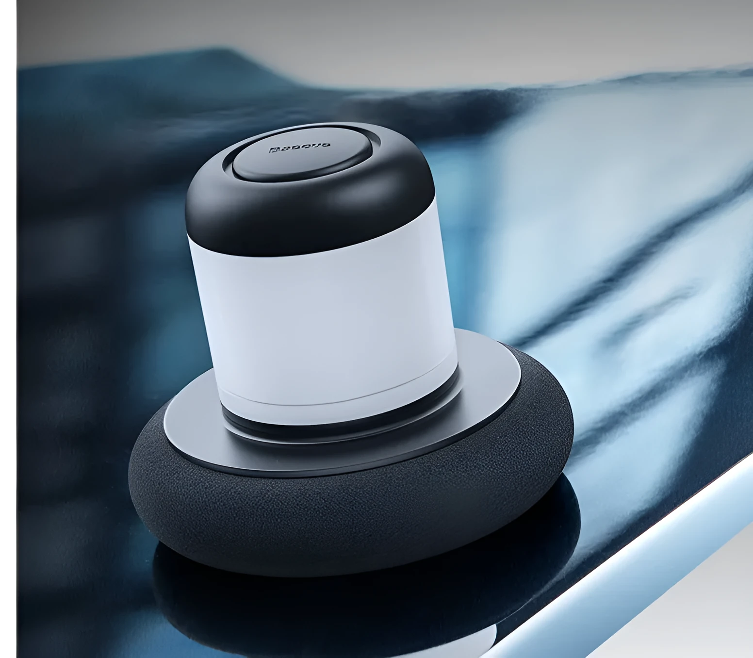 Dual-action car polishing machine with 6 speed settings in black ABS PC body with sponge pad attached