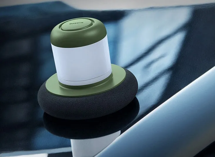 Dual-action car polishing machine with 6 speed settings in black ABS PC body with sponge pad attached