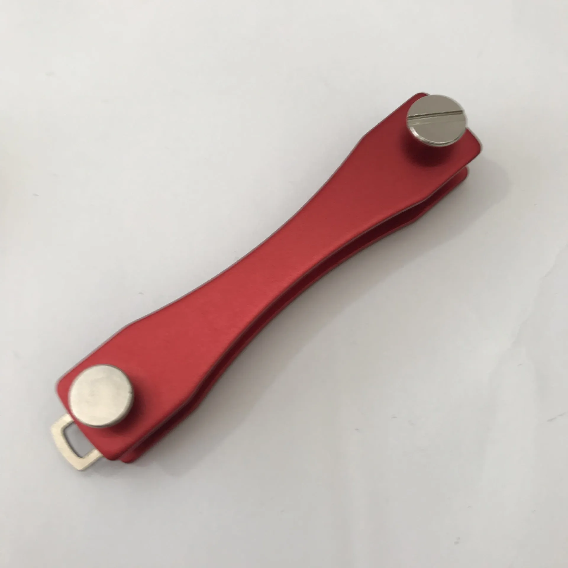 KEY SMART metal key clip in black aluminium alloy, 8.8cm long, showing keys attached to the compact holder
