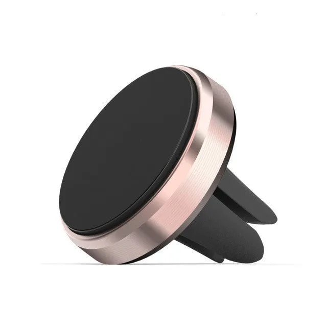 Magnetic car air outlet phone bracket in black attached to a vehicle vent