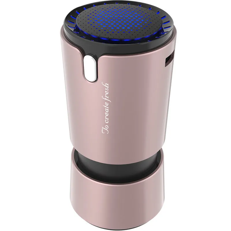 Portable mini car air purifier with True HEPA filter, USB cable, compact silver cup shape on car cup holder