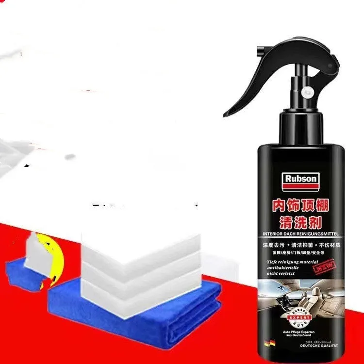Bottle of enzyme-based fabric ceiling cleaner with towel and sponge wipes on a car roof