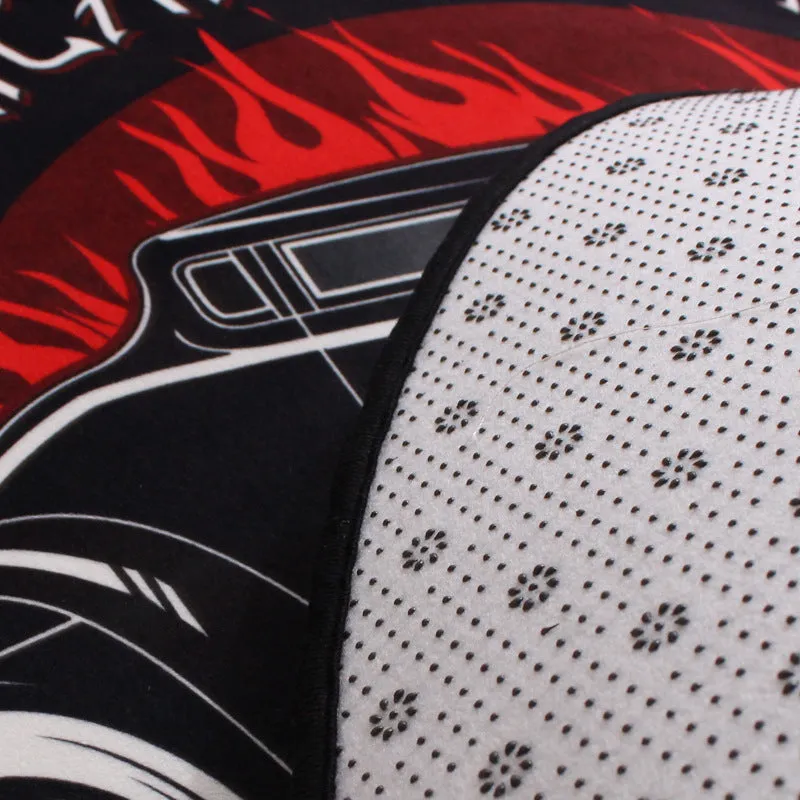 Round polyester fibre door mat with non-slip backing, water-absorbing surface, and printed car design in a home entrance