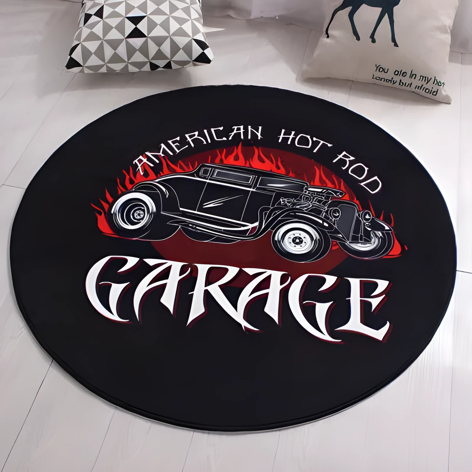 Round polyester fibre door mat with non-slip backing, water-absorbing surface, and printed car design in a home entrance