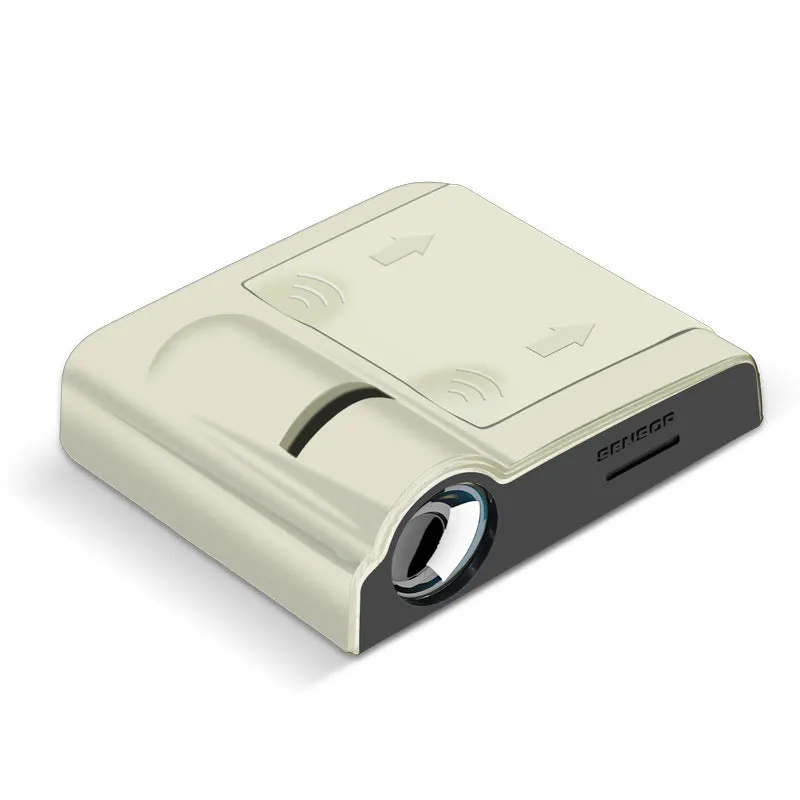Compact black or beige ABS plastic car decorative projection radium lamp with battery compartment.