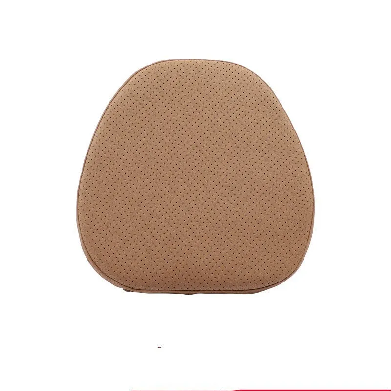 Minimalist brown synthetic fibre headrest and lumbar support cushion for a Volvo car seat.