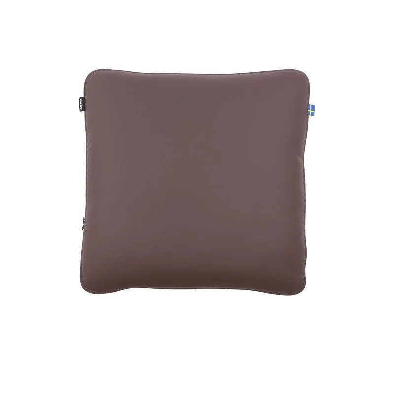 Minimalist brown synthetic fibre headrest and lumbar support cushion for a Volvo car seat.