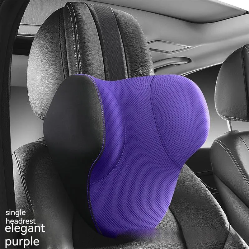 Black memory foam car headrest pillow and lumbar support pillow on a car seat