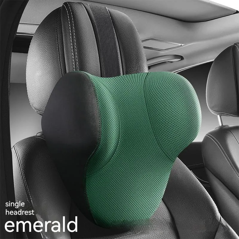 Black memory foam car headrest pillow and lumbar support pillow on a car seat