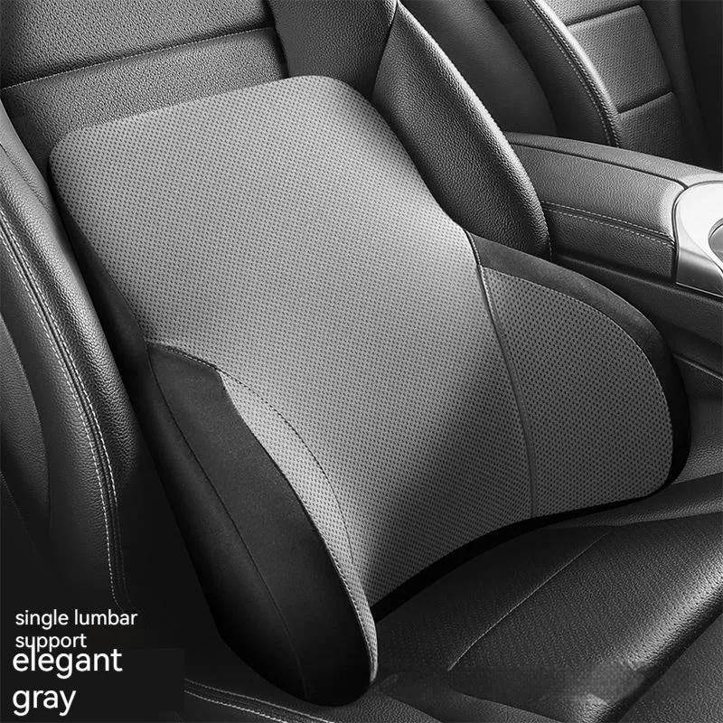 Black memory foam car headrest pillow and lumbar support pillow on a car seat