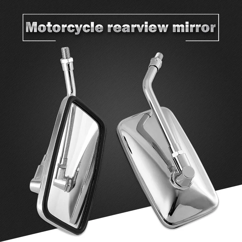 Silver all-metal motorcycle rearview mirror with convex lens on a dark background