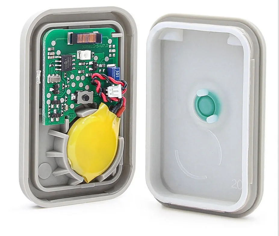 TPMS-19 TPMS activation tool for Ford, compact plastic tool approximately 5cm long, grey casing, single test button