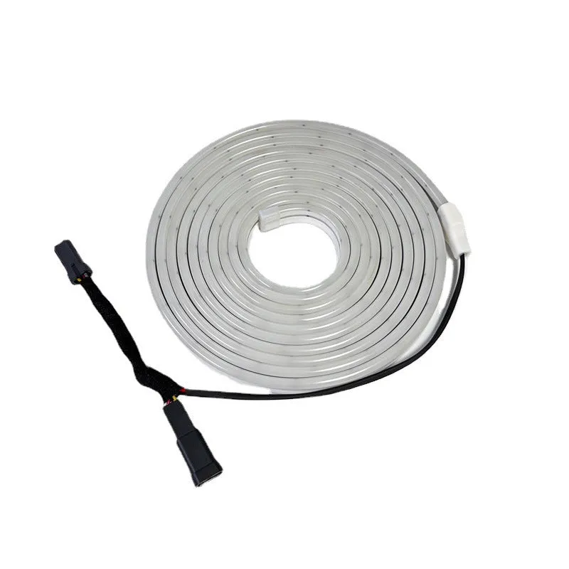 Tesla Model 3 and Model Y front footwell ambient lighting kit with soft silicone light bar in three colour options