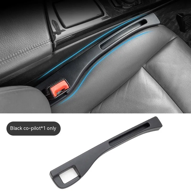 Black plastic car seat gap storage organiser box with handle between vehicle seats