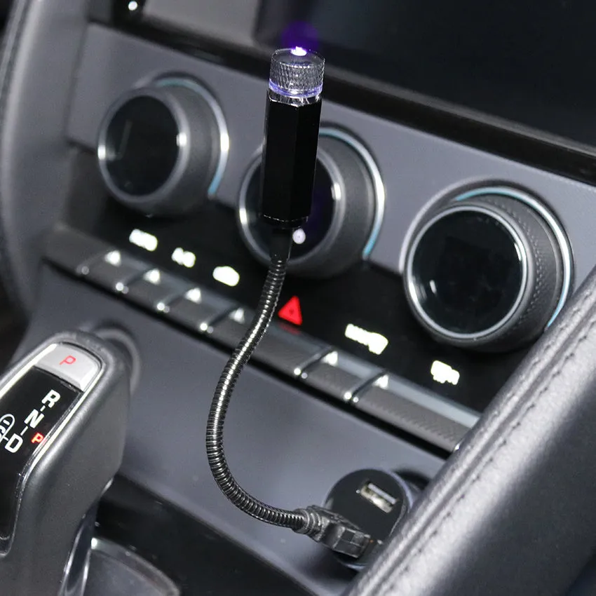 Mini LED car roof star night light projector with metal housing, showing red or purple illumination option