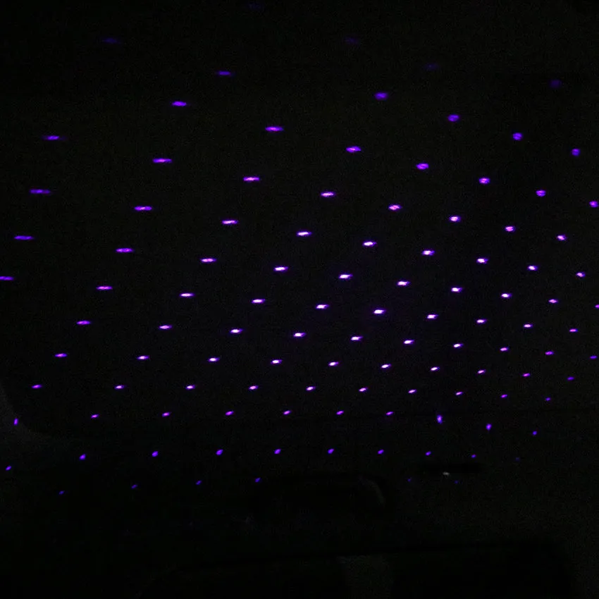 Mini LED car roof star night light projector with metal housing, showing red or purple illumination option