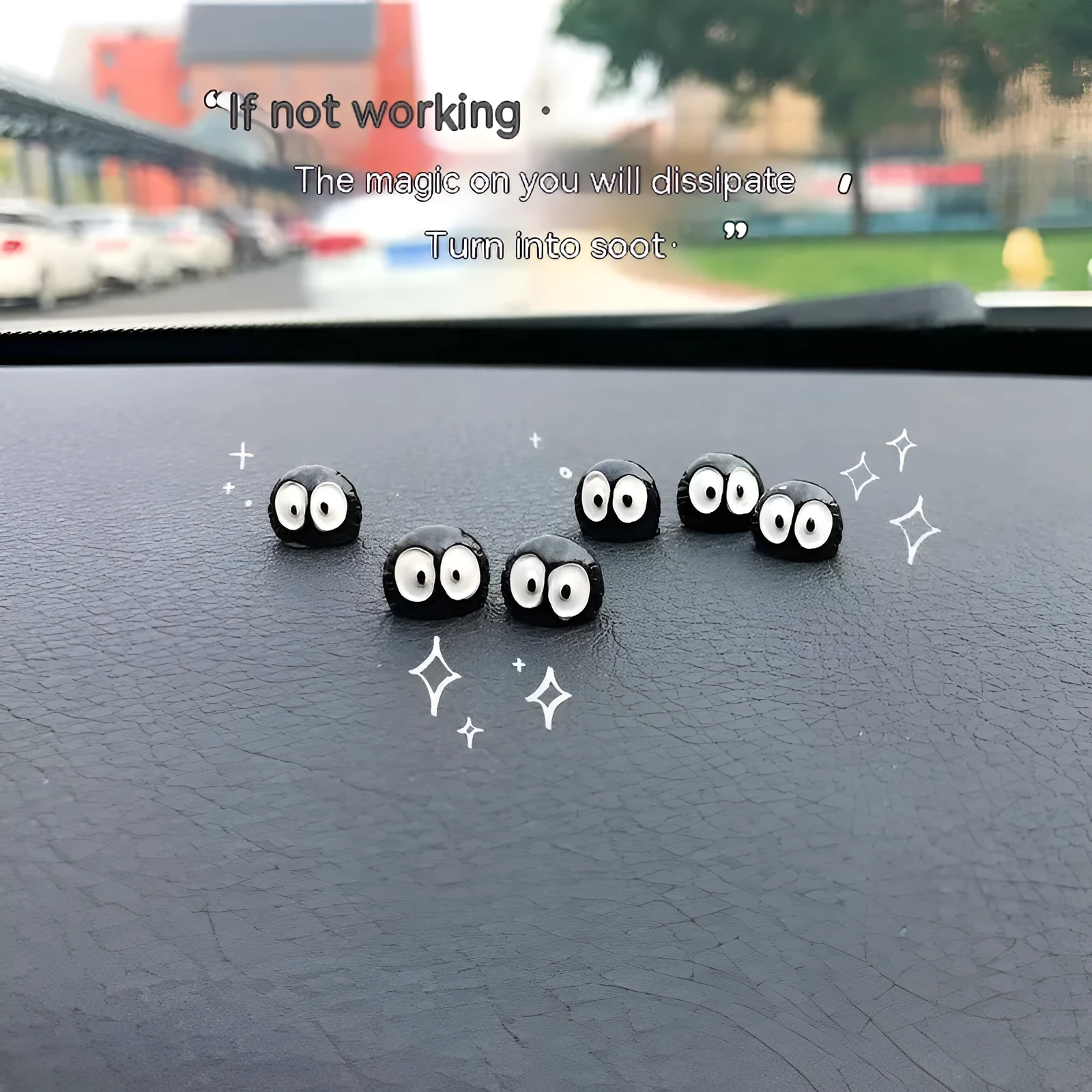 Small black resin cartoon coal ball car decoration with traceless adhesive tape.