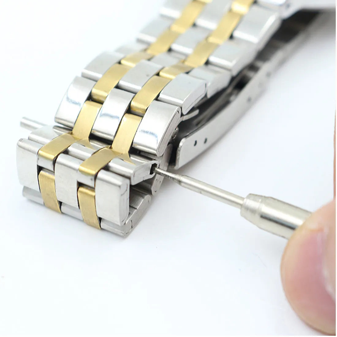 Stainless steel spring bar remover tool with V-edged and push-pin tips, 8.5cm length, on a grey background