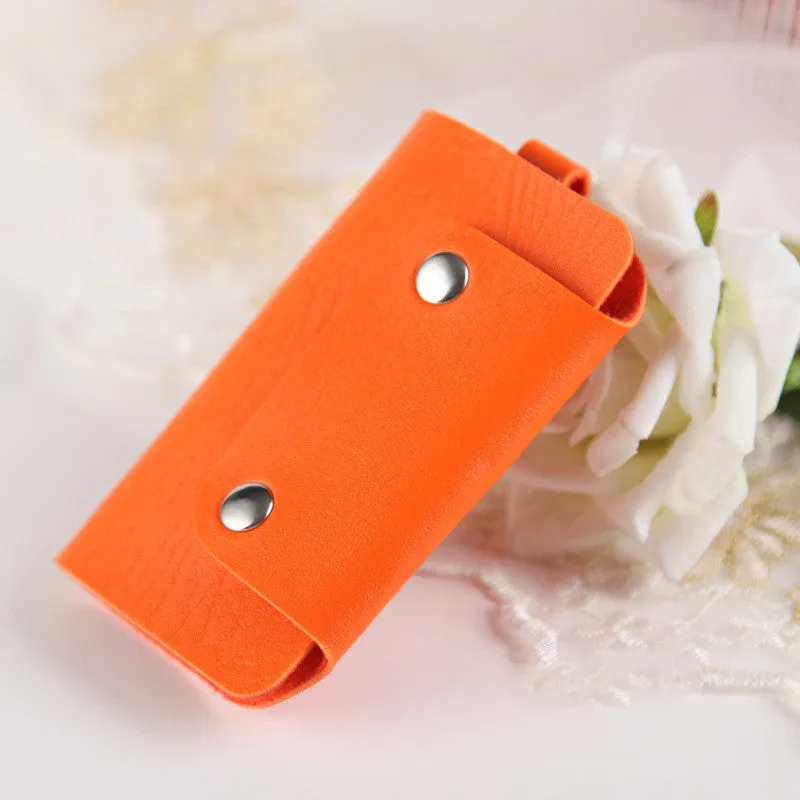 Soft PU leather colour button key case in square vertical section with key bit and cover opening in plain Korean style