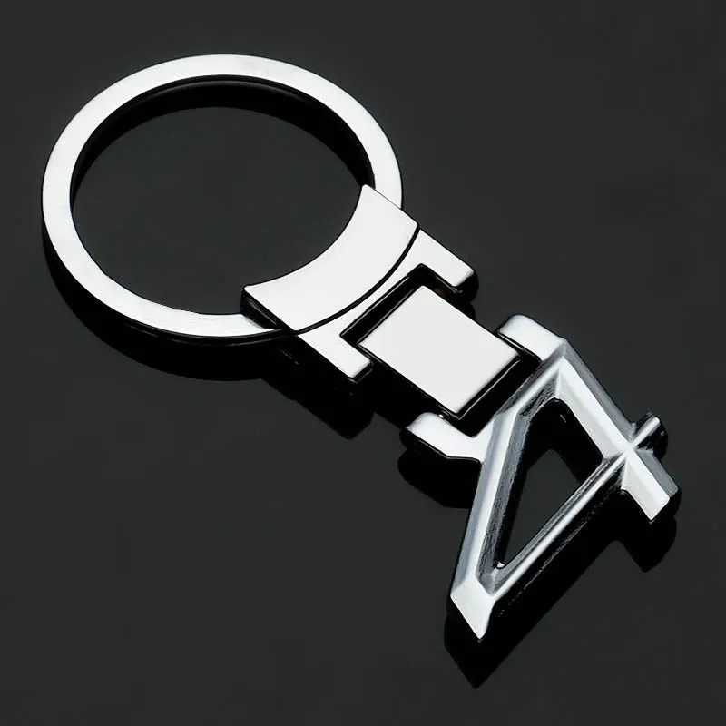 Zinc alloy metal keychain 67mm long on a wooden surface with a set of keys attached