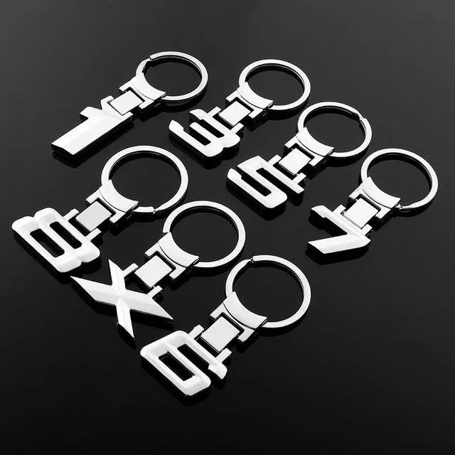 Zinc alloy metal keychain 67mm long on a wooden surface with a set of keys attached