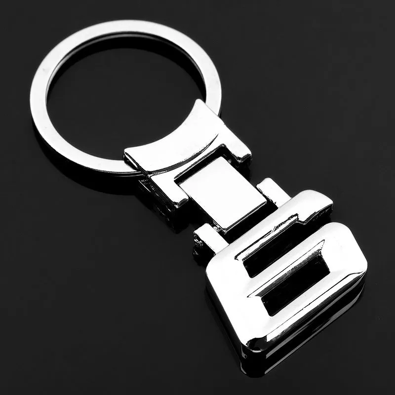 Zinc alloy metal keychain 67mm long on a wooden surface with a set of keys attached