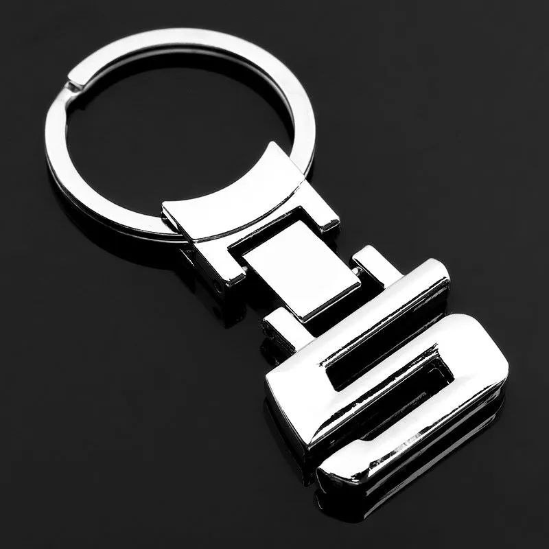 Zinc alloy metal keychain 67mm long on a wooden surface with a set of keys attached