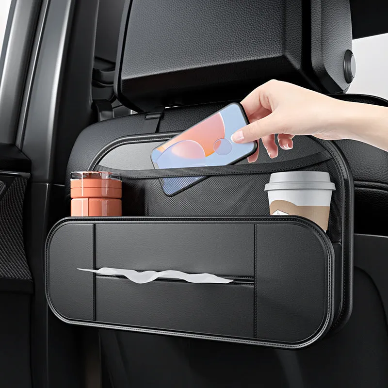 Black leather car seat storage bag with customisable compartments mounted on vehicle seatback