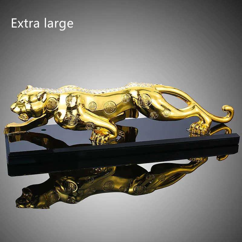 Leopard car perfume ornament made of alloy crystal base plate and resin in gold finish on car dashboard
