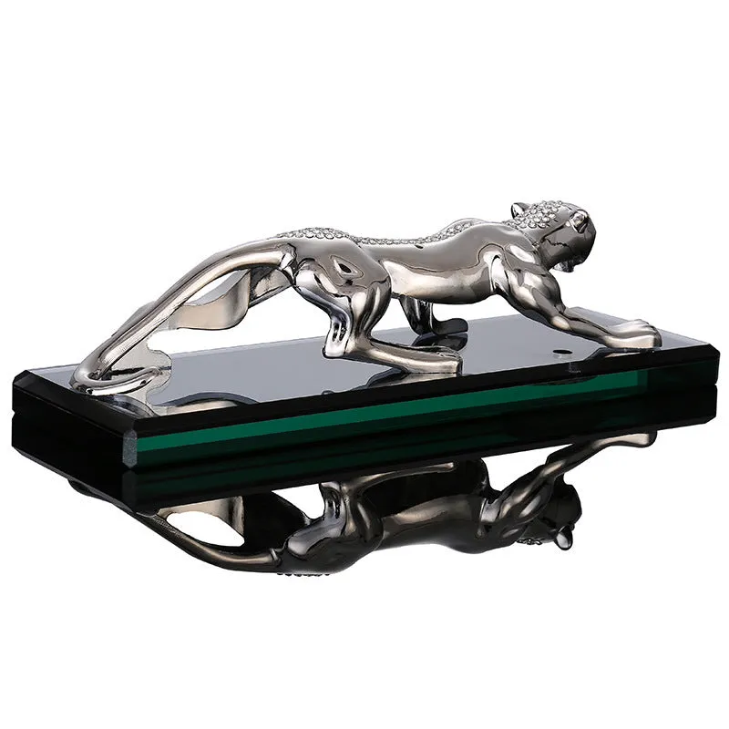 Leopard car perfume ornament made of alloy crystal base plate and resin in gold finish on car dashboard