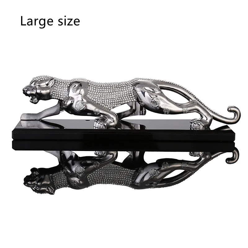 Leopard car perfume ornament made of alloy crystal base plate and resin in gold finish on car dashboard