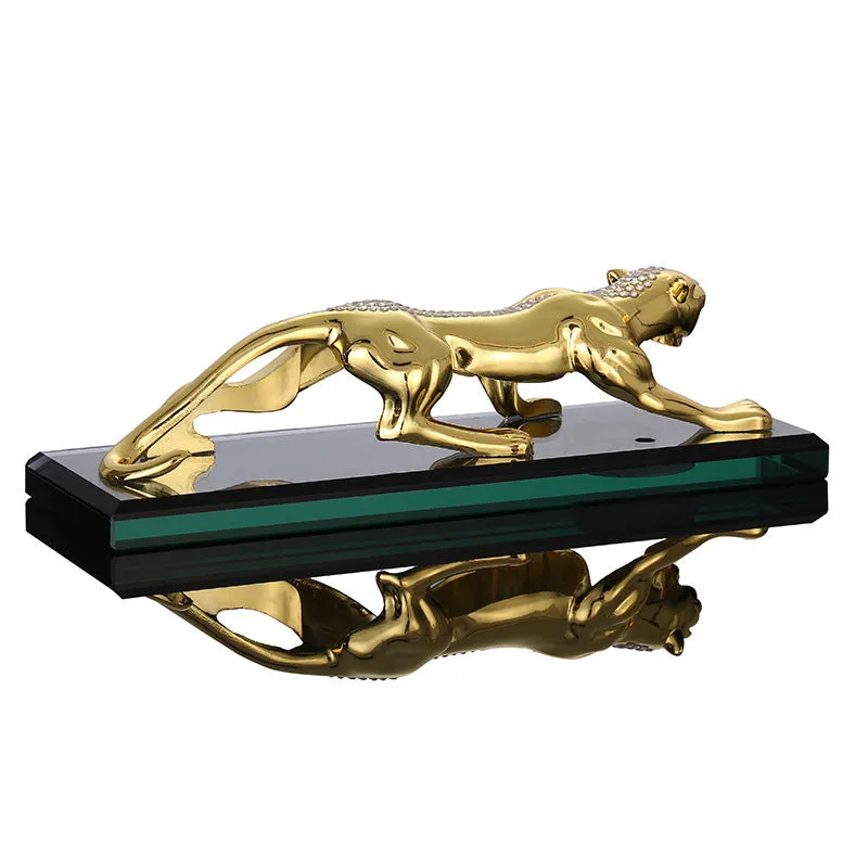 Leopard car perfume ornament made of alloy crystal base plate and resin in gold finish on car dashboard