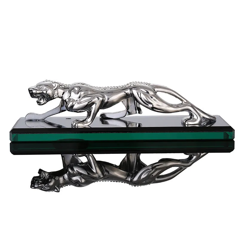 Leopard car perfume ornament made of alloy crystal base plate and resin in gold finish on car dashboard