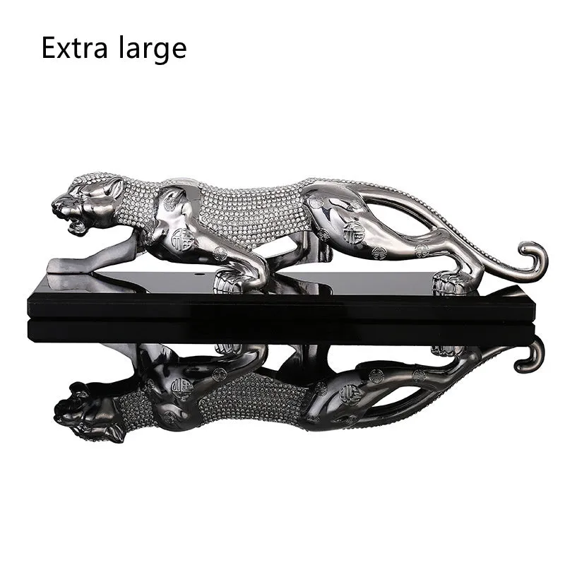 Leopard car perfume ornament made of alloy crystal base plate and resin in gold finish on car dashboard
