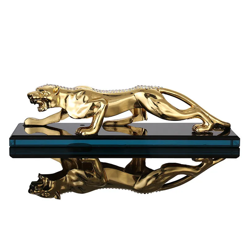 Leopard car perfume ornament made of alloy crystal base plate and resin in gold finish on car dashboard