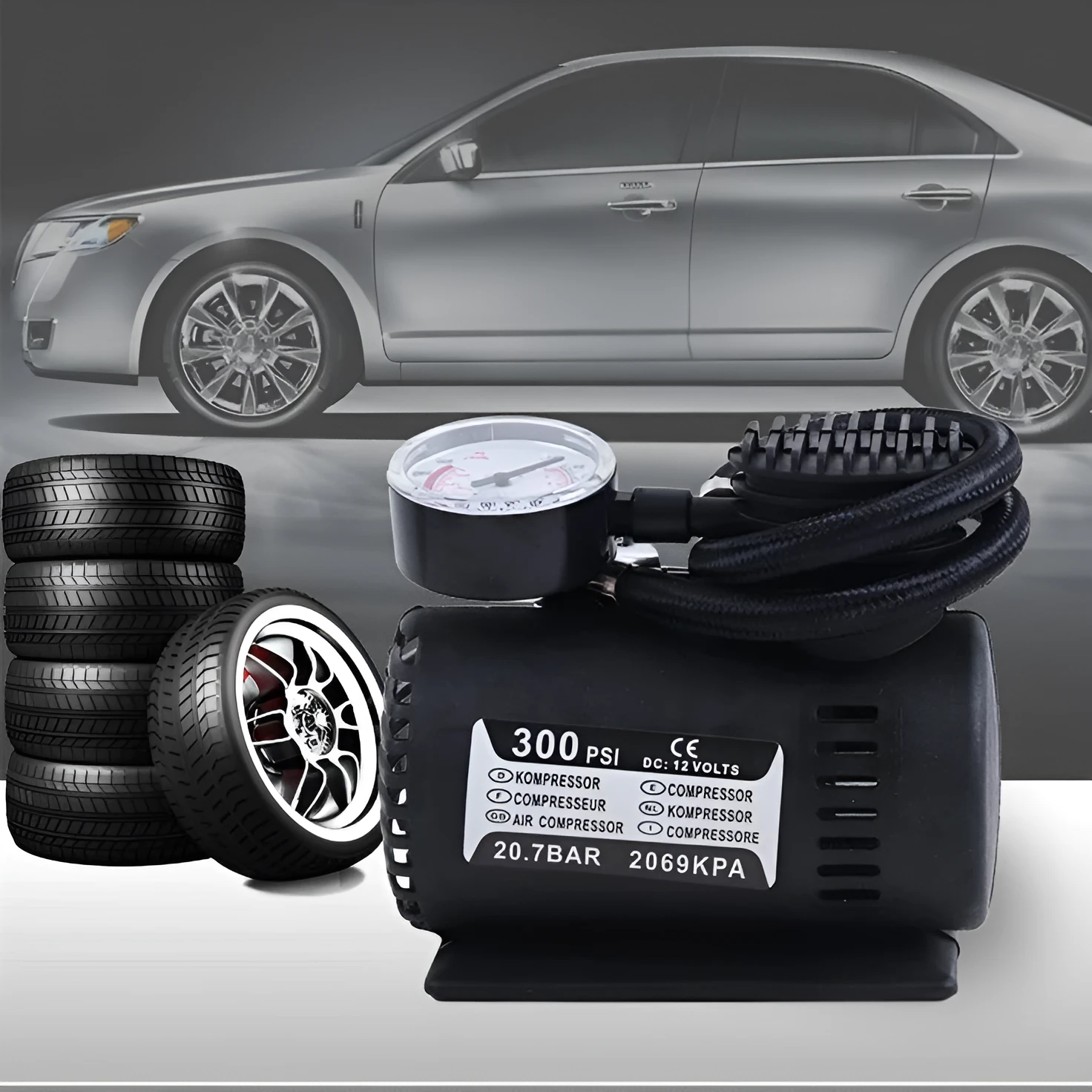 Mini 12V car air compressor in black with pressure gauge and 9-foot cord