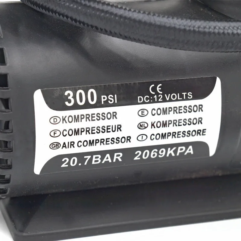 Mini 12V car air compressor in black with pressure gauge and 9-foot cord